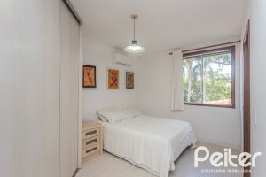 Casa em Condomínio à venda com 395m², 4 dormitórios, 4 suítes, 4 vagas, no bairro Cavalhada em PORTO ALEGRE
