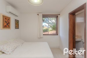 Casa em Condomínio à venda com 395m², 4 dormitórios, 4 suítes, 4 vagas, no bairro Cavalhada em PORTO ALEGRE
