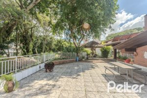 Casa em Condomínio à venda com 395m², 4 dormitórios, 4 suítes, 4 vagas, no bairro Cavalhada em PORTO ALEGRE