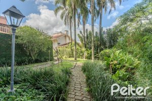Casa em Condomínio à venda com 395m², 4 dormitórios, 4 suítes, 4 vagas, no bairro Cavalhada em PORTO ALEGRE
