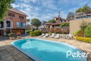 Casa em Condomínio à venda com 145m², 3 dormitórios, 1 suíte, 2 vagas, no bairro Tristeza em Porto Alegre