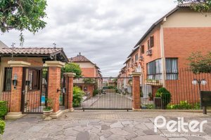Casa em Condomínio à venda com 145m², 3 dormitórios, 1 suíte, 2 vagas, no bairro Tristeza em Porto Alegre