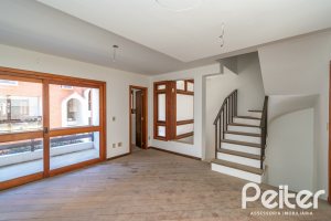 Casa em Condomínio à venda com 145m², 3 dormitórios, 1 suíte, 2 vagas, no bairro Tristeza em Porto Alegre