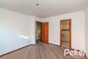 Casa em Condomínio à venda com 145m², 3 dormitórios, 1 suíte, 2 vagas, no bairro Tristeza em Porto Alegre