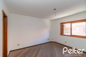 Casa em Condomínio à venda com 145m², 3 dormitórios, 1 suíte, 2 vagas, no bairro Tristeza em Porto Alegre