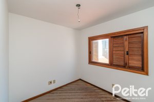 Casa em Condomínio à venda com 145m², 3 dormitórios, 1 suíte, 2 vagas, no bairro Tristeza em Porto Alegre