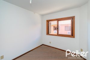 Casa em Condomínio à venda com 145m², 3 dormitórios, 1 suíte, 2 vagas, no bairro Tristeza em Porto Alegre