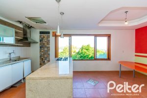 Casa à venda com 380m², 4 dormitórios, 2 suítes, 3 vagas, no bairro Vila Assunção em Porto Alegre