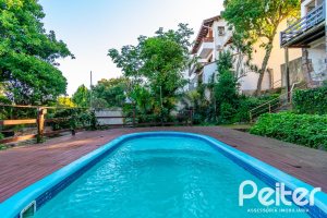 Casa à venda com 380m², 4 dormitórios, 2 suítes, 3 vagas, no bairro Vila Assunção em Porto Alegre