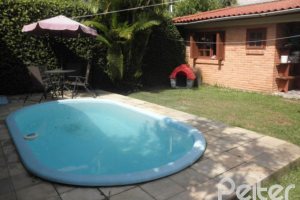 Casa à venda com 160m², 3 dormitórios, 1 suíte, 2 vagas, no bairro Ipanema em Porto Alegre