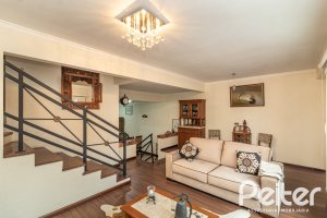 Casa em Condomínio à venda com 210m², 4 dormitórios, 2 suítes, 2 vagas, no bairro Vila Assunção em Porto Alegre