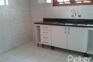 Casa à venda com 158m², 3 dormitórios, 1 suíte, 2 vagas, no bairro Ipanema em Porto Alegre