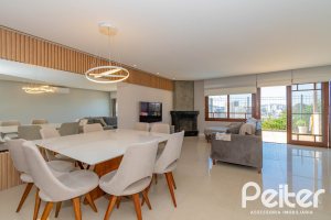 Casa em Condomínio à venda com 254m², 3 dormitórios, 1 suíte, 3 vagas, no bairro Vila Assunção em Porto Alegre
