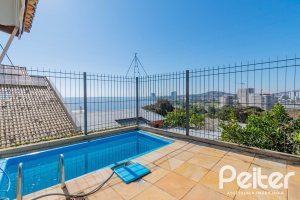 Casa em Condomínio à venda com 254m², 3 dormitórios, 1 suíte, 3 vagas, no bairro Vila Assunção em Porto Alegre