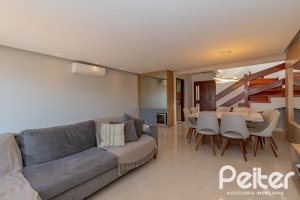 Casa em Condomínio à venda com 254m², 3 dormitórios, 1 suíte, 3 vagas, no bairro Vila Assunção em Porto Alegre