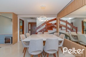 Casa em Condomínio à venda com 254m², 3 dormitórios, 1 suíte, 3 vagas, no bairro Vila Assunção em Porto Alegre