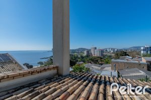 Casa em Condomínio à venda com 254m², 3 dormitórios, 1 suíte, 3 vagas, no bairro Vila Assunção em Porto Alegre