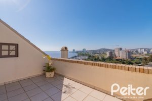 Casa em Condomínio à venda com 254m², 3 dormitórios, 1 suíte, 3 vagas, no bairro Vila Assunção em Porto Alegre