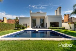 Casa em Condomínio à venda com 550m², 3 dormitórios, 3 suítes, 4 vagas, no bairro Terra Ville em PORTO ALEGRE