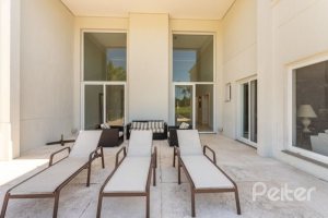 Casa em Condomínio à venda com 550m², 3 dormitórios, 3 suítes, 4 vagas, no bairro Terra Ville em PORTO ALEGRE