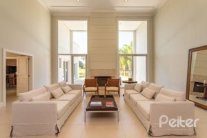 Casa em Condomínio à venda com 550m², 3 dormitórios, 3 suítes, 4 vagas, no bairro Terra Ville em PORTO ALEGRE