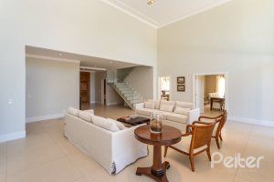 Casa em Condomínio à venda com 550m², 3 dormitórios, 3 suítes, 4 vagas, no bairro Terra Ville em PORTO ALEGRE