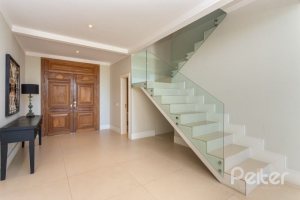 Casa em Condomínio à venda com 550m², 3 dormitórios, 3 suítes, 4 vagas, no bairro Terra Ville em PORTO ALEGRE