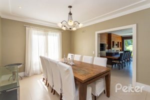 Casa em Condomínio à venda com 550m², 3 dormitórios, 3 suítes, 4 vagas, no bairro Terra Ville em PORTO ALEGRE