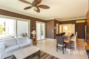 Casa em Condomínio à venda com 550m², 3 dormitórios, 3 suítes, 4 vagas, no bairro Terra Ville em PORTO ALEGRE