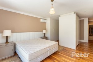 Casa em Condomínio à venda com 550m², 3 dormitórios, 3 suítes, 4 vagas, no bairro Terra Ville em PORTO ALEGRE