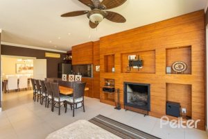 Casa em Condomínio à venda com 550m², 3 dormitórios, 3 suítes, 4 vagas, no bairro Terra Ville em PORTO ALEGRE