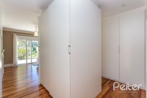 Casa em Condomínio à venda com 550m², 3 dormitórios, 3 suítes, 4 vagas, no bairro Terra Ville em PORTO ALEGRE