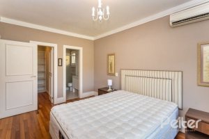 Casa em Condomínio à venda com 550m², 3 dormitórios, 3 suítes, 4 vagas, no bairro Terra Ville em PORTO ALEGRE