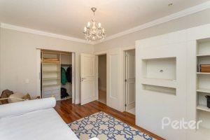 Casa em Condomínio à venda com 550m², 3 dormitórios, 3 suítes, 4 vagas, no bairro Terra Ville em PORTO ALEGRE