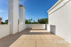 Casa em Condomínio à venda com 550m², 3 dormitórios, 3 suítes, 4 vagas, no bairro Terra Ville em PORTO ALEGRE