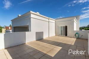 Casa em Condomínio à venda com 550m², 3 dormitórios, 3 suítes, 4 vagas, no bairro Terra Ville em PORTO ALEGRE