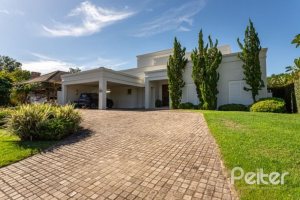 Casa em Condomínio à venda com 550m², 3 dormitórios, 3 suítes, 4 vagas, no bairro Terra Ville em PORTO ALEGRE