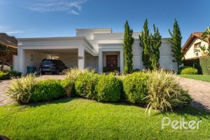 Casa em Condomínio à venda com 550m², 3 dormitórios, 3 suítes, 4 vagas, no bairro Terra Ville em PORTO ALEGRE