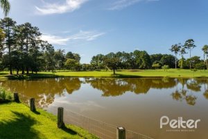 Casa em Condomínio à venda com 550m², 3 dormitórios, 3 suítes, 4 vagas, no bairro Terra Ville em PORTO ALEGRE