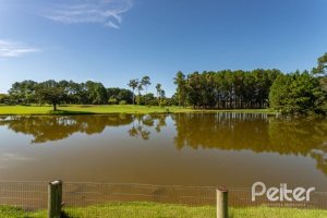 Casa em Condomínio à venda com 550m², 3 dormitórios, 3 suítes, 4 vagas, no bairro Terra Ville em PORTO ALEGRE