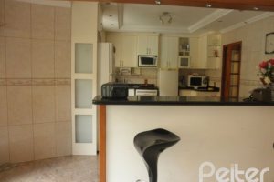 Casa à venda com 350m², 3 dormitórios, 1 suíte, 4 vagas, no bairro Ipanema em Porto Alegre