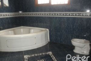 Casa à venda com 350m², 3 dormitórios, 1 suíte, 4 vagas, no bairro Ipanema em Porto Alegre