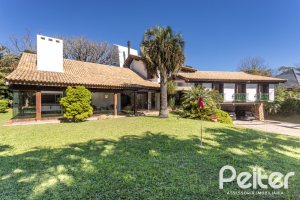 Casa em Condomínio à venda com 600m², 4 dormitórios, 4 suítes, 6 vagas, no bairro Cavalhada em PORTO ALEGRE