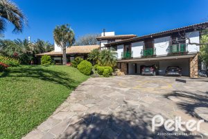 Casa em Condomínio à venda com 600m², 4 dormitórios, 4 suítes, 6 vagas, no bairro Cavalhada em PORTO ALEGRE