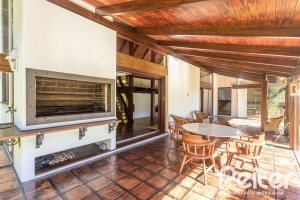 Casa em Condomínio à venda com 600m², 4 dormitórios, 4 suítes, 6 vagas, no bairro Cavalhada em PORTO ALEGRE