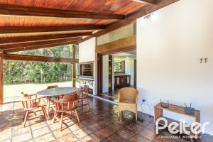 Casa em Condomínio à venda com 600m², 4 dormitórios, 4 suítes, 6 vagas, no bairro Cavalhada em PORTO ALEGRE