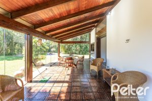 Casa em Condomínio à venda com 600m², 4 dormitórios, 4 suítes, 6 vagas, no bairro Cavalhada em PORTO ALEGRE