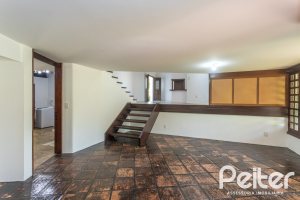 Casa em Condomínio à venda com 600m², 4 dormitórios, 4 suítes, 6 vagas, no bairro Cavalhada em PORTO ALEGRE