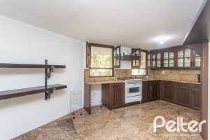 Casa em Condomínio à venda com 600m², 4 dormitórios, 4 suítes, 6 vagas, no bairro Cavalhada em PORTO ALEGRE