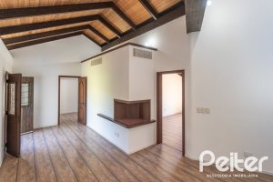 Casa em Condomínio à venda com 600m², 4 dormitórios, 4 suítes, 6 vagas, no bairro Cavalhada em PORTO ALEGRE